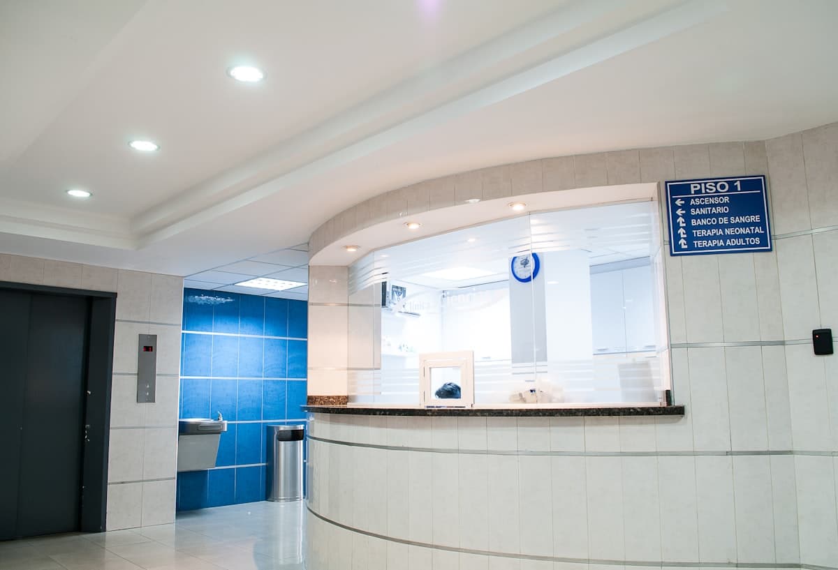 Hospital corridor with clinical staff