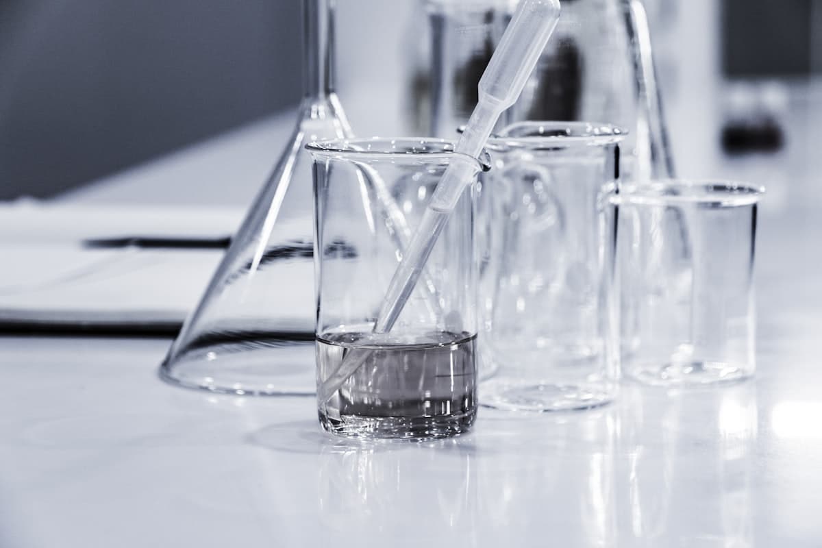 Microscope and research notes in a science lab