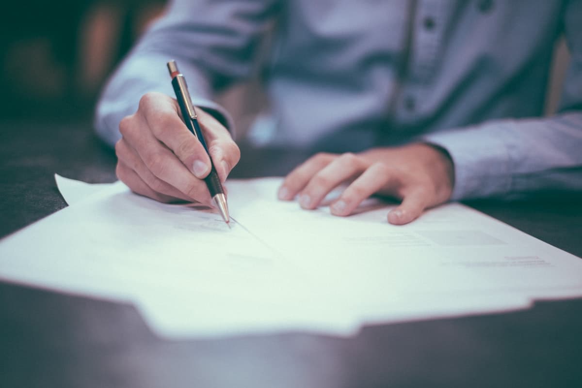 Legal documents and pen on a desk