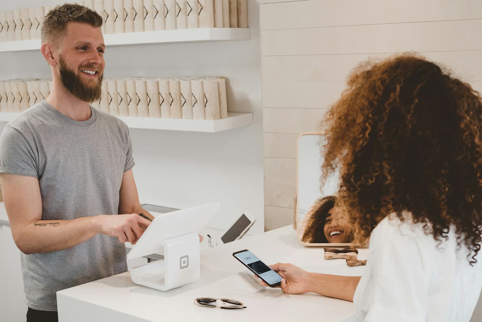Person using a smartphone for messaging and customer engagement.